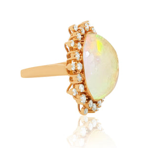 Beautiful Snowflake Opal Ring adorned with diamonds in rose gold setting 