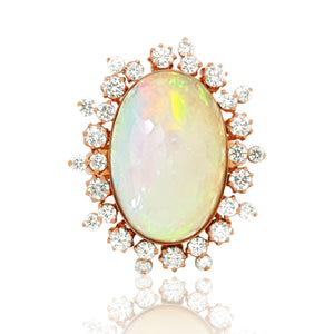 Beautiful Snowflake Opal Ring adorned with diamonds in rose gold setting 