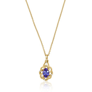 Oval Tanzanite Flower Pendant In Yellow Gold