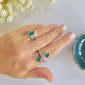Pear Shape Emerald Halo Triple Shank Ring